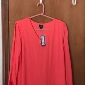 Beautiful coral spring/summer dress perfect for a wedding or semi-formal event